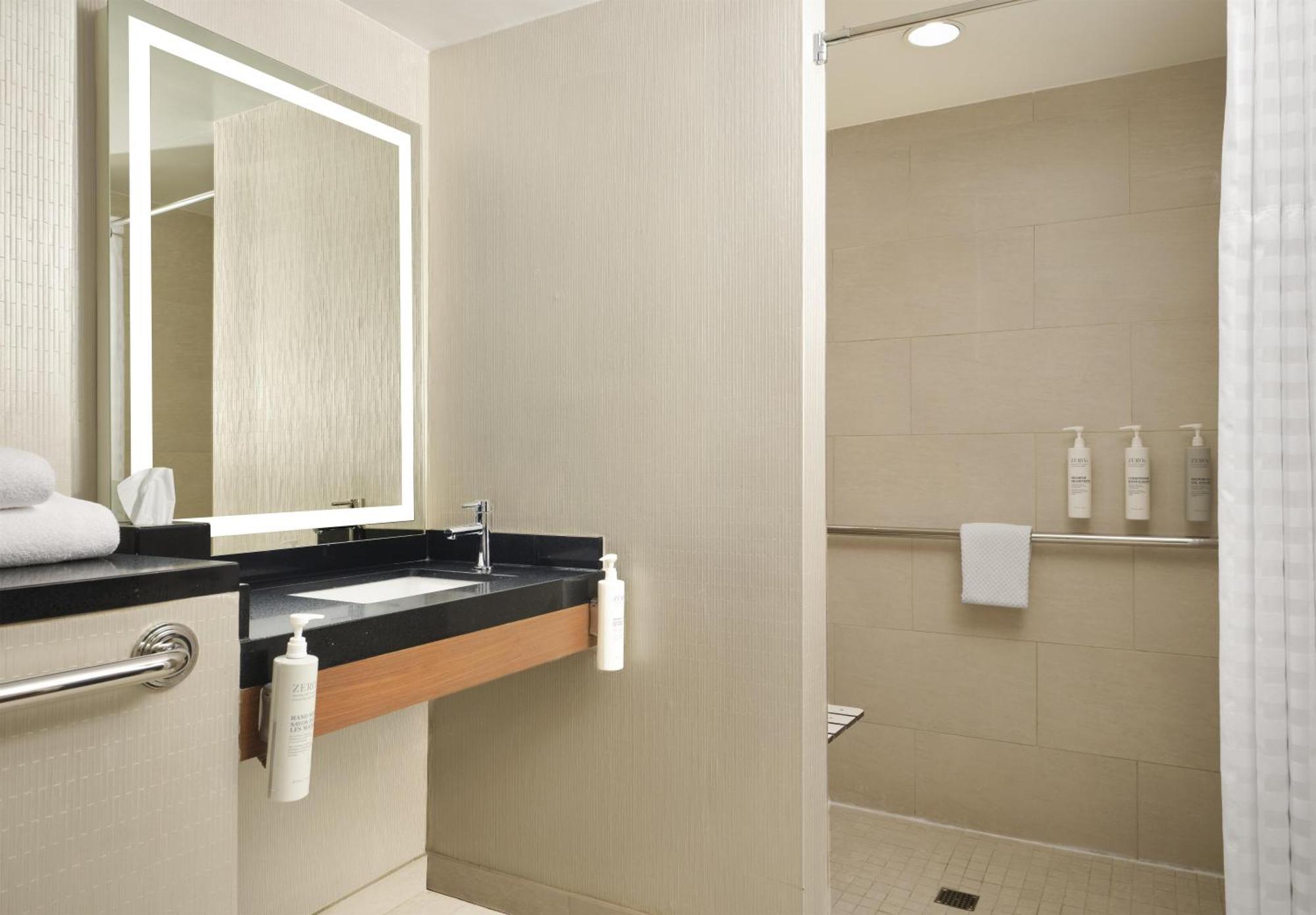 One-Bedroom Suite Two Double Beds Roll Shower Mobility Access or Non-Smoking